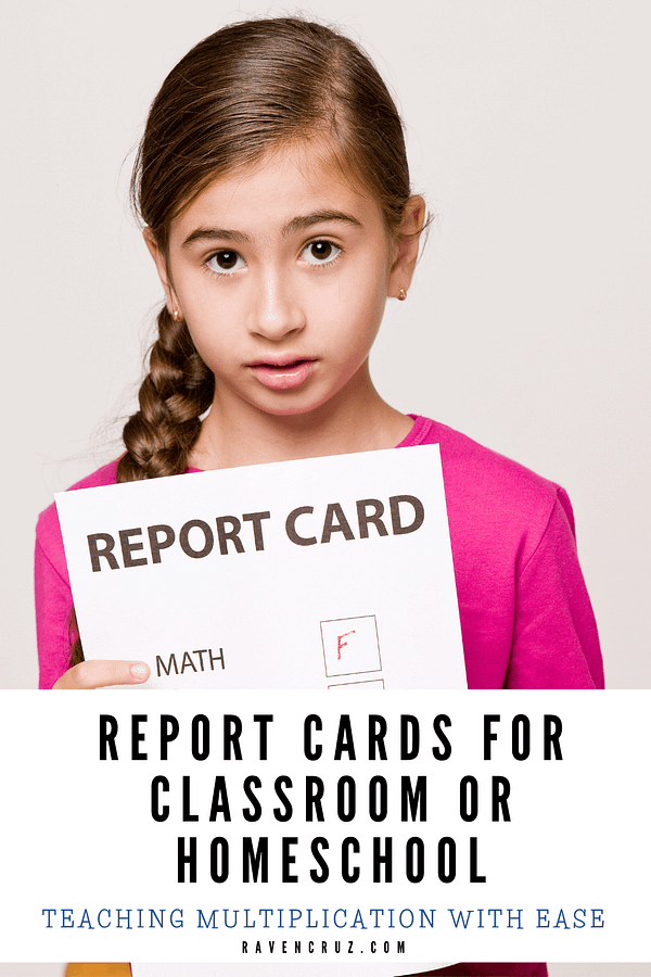 girl holding a report card